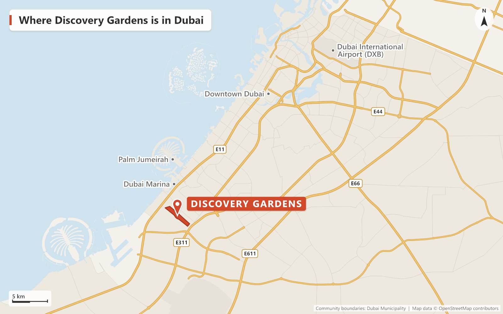 Map of Dubai showing where Discovery Gardens is, inland from Dubai Marina between Sheikh Zayed Road (E11) and Sheikh Mohammed Bin Zayed Road (E311), with Palm Jumeirah, Downtown Dubai and Dubai International Airport marked for reference.