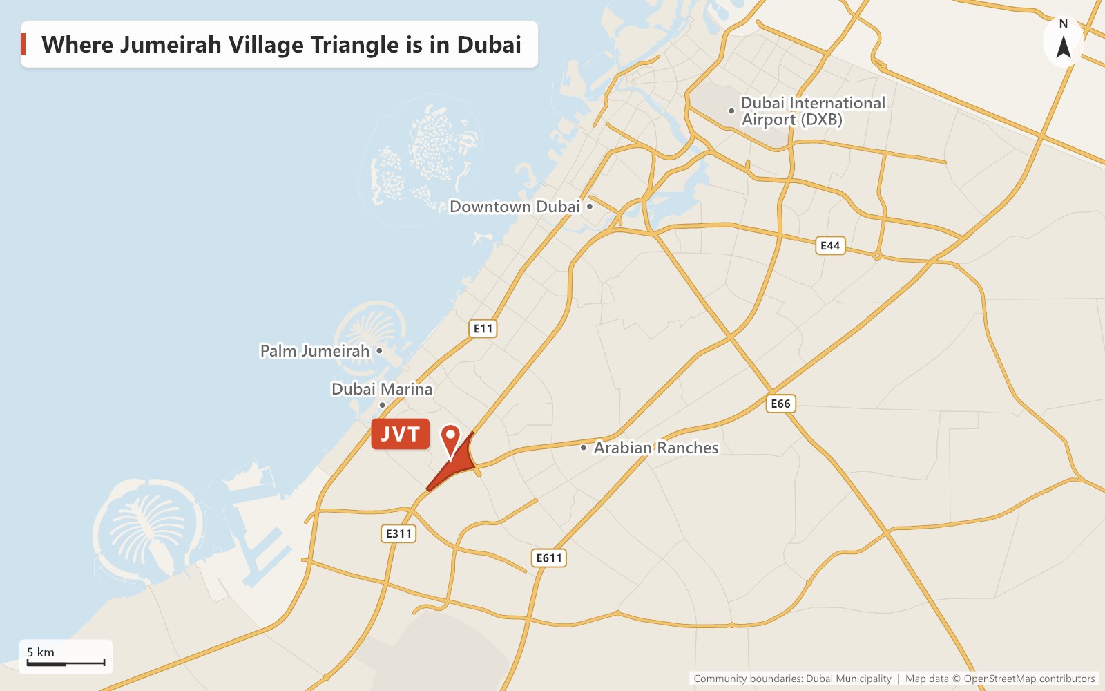 Close-up map of Jumeirah Village Triangle outlined in red between Sheikh Mohammed Bin Zayed Road (E311) and Al Khail Road (E44), next to The Springs, Jumeirah Park, Jumeirah Village Circle and Dubai Production City, with Central Park and JVT District 1 Park inside and City Centre Me'aisem and Mediclinic Me'aisem just across the E311.