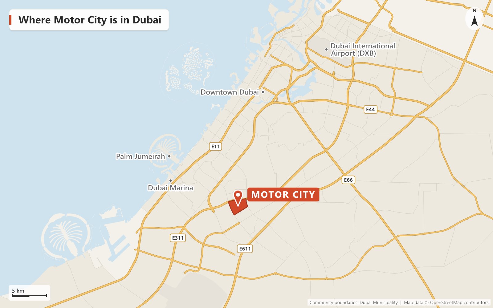 Close-up map of Motor City outlined in red between Sheikh Mohammed Bin Zayed Road (E311), Hessa Street and Al Qudra Street (D63), next to Arjan, Dubai Sports City, Dubai Studio City and Arabian Ranches, with Dubai Autodrome, First Avenue Mall, Joud Boulevard with Lulu Hypermarket, GEMS Metropole School, two nurseries, Health Bay Clinic, Al Eman Mosque and Knot Garden marked.